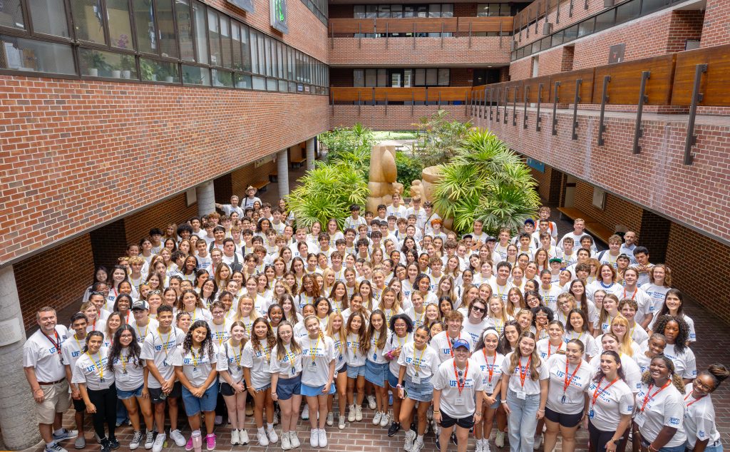 Group photo of the SMI 2025 class in the Weimer Hall atrium.