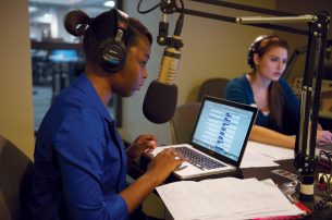 Students Nickelle Smith and Stephanie Denardo in the radio booth.