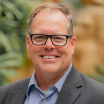 Headshot of Dan Windels in College Atrium