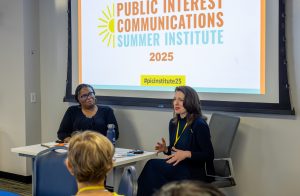 Abbigail Tumpey speaks during the opening session, in which she engaged in a conversation with Natalie Tindall. Photo credit: Jenna Ayoub.