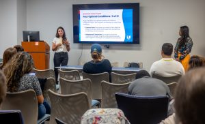 Facilitator Arielle Mizrahi presents about how to help students bridge divides. Photo credit: Jenna Ayoub.