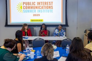 Closing session panelist Charity Johnson speaks while fellow panelists Marrianne McMullen and Quiana Pinckney listen. Photo credit: Jenna Ayoub.