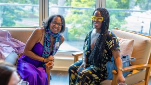 Rachel Grant and Necole Norris at the summer institute welcome reception. Photo credit: Jenna Ayoub.