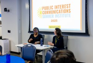 Natalie Tindall chats with Abbigail Tumpey in the opening session of the 2025 summer institute. Photo credit: Jenna Ayoub.