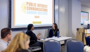 Natalie Tindall chats with Abbigail Tumpey in the opening session of the 2025 summer institute. Photo credit: Jenna Ayoub.