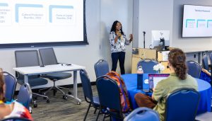 Kelsy Adams presents research during a graduate student research presentation session. Photo credit: Jenna Ayoub.