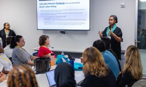 Keisha Tassie presents information during a session on culturally centered pedagogy. Photo credit: Jenna Ayoub.