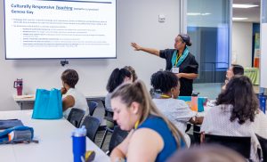 Keisha Tassie presents information during a session on culturally centered pedagogy. Photo credit: Jenna Ayoub.