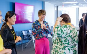 Celeste Greene leads a Laughter Yoga session. Photo credit: Jenna Ayoub.