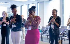 Attendees at the Laughter Yoga session. Photo credit: Jenna Ayoub.