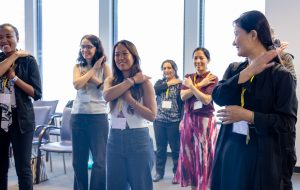 Attendees at the Laughter Yoga session. Photo credit: Jenna Ayoub.