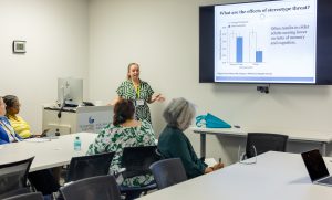 Sarah Barber discusses how negative stereotypes and concerns about aging can affect cognitive performance as we grow older. Photo credit: Jenna Ayoub.