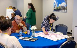 Attendees brainstorm ideas during a session about film and social change. Photo credit: Jenna Ayoub.