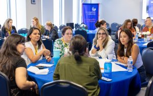Attendees engage with each other during a session. Photo credit: Jenna Ayoub.