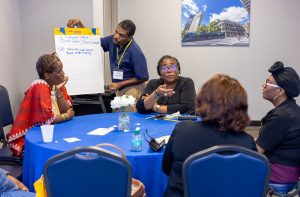 Attendees discuss ideas during a session about film and social change. Photo credit: Jenna Ayoub.