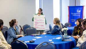 Elizabeth Calienes facilitates a session about film and social change. Photo credit: Jenna Ayoub.