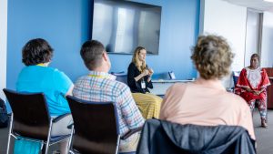 Piper Hendricks facilitates a session on wellness. Photo credit: Jenna Ayoub.