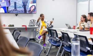 Chris Omni leads a session on Black womanhood and optimal aging. Photo credit: Jenna Ayoub.