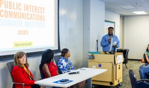 The closing session featured panelists Marrianne McMullen, Charity Johnson and Quiana Pinckney. Facilitator Kevin Hardges is speaking. Photo credit: Jenna Ayoub.