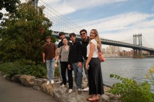 Gotham Week students in front of the Brooklyn Bridge.