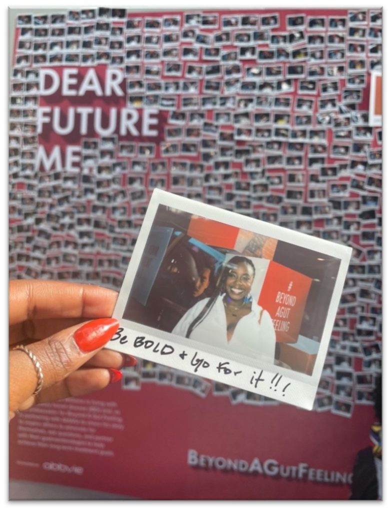 A Polaroid photo held in a hand. 