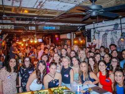 Students from the Summer 2024 programs gather for a networking happy hour.