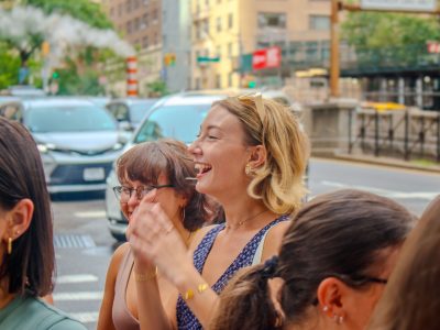 Erin Enabit, PUR ‘24, laughs with friends at the 2024 One Week PR and Advertising program.