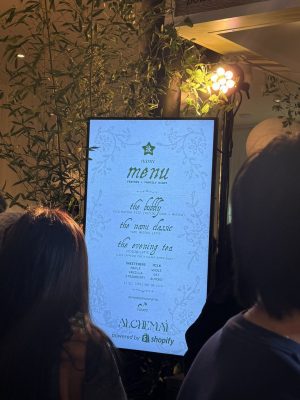 A menu sign at the front of a restaurant.